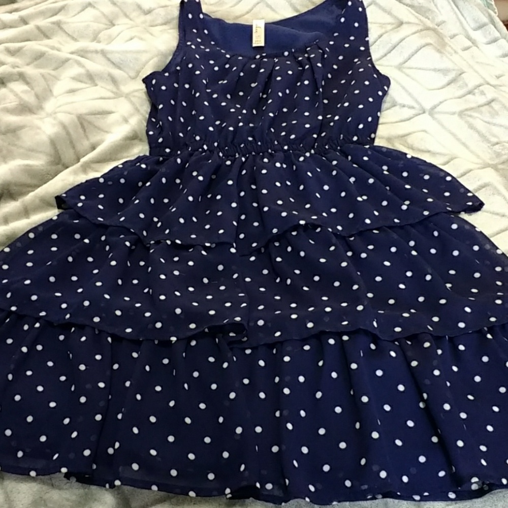 Blue and white ruffled and polka dotted dress